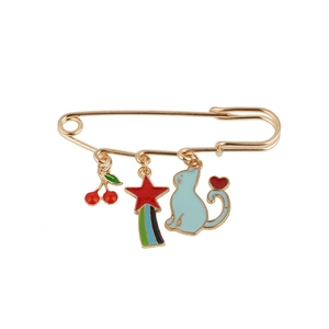 Golden safety pin brooch with cute blue cat, red cherry and star charms for clothing