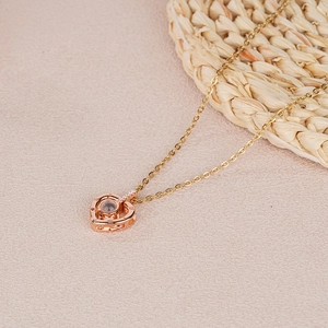 Rose gold heart projection necklace with 100 languages of love and zircon accents