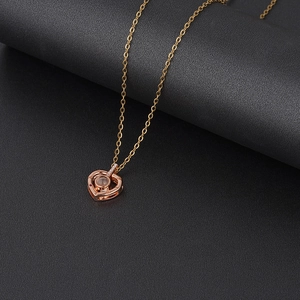 Rose gold heart projection necklace for couples with round crystal and zircon accents