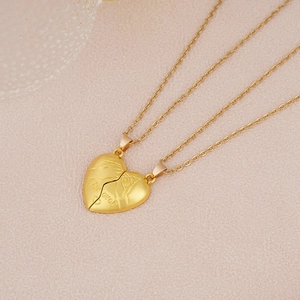 Detail of magnetic heart puzzle pendant with Forever engraving and pink texture