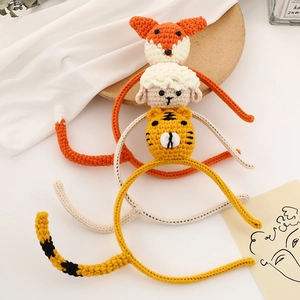 Handmade knitted animal headbands featuring cute fox, lamb, and tiger patterns