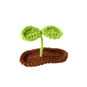 Handmade crochet green sprout hair clip with cute plant leaf design and soft wool texture