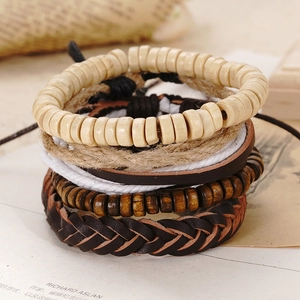 Detailed close-up of multi-layer leather bracelet set with wooden beads and woven cords