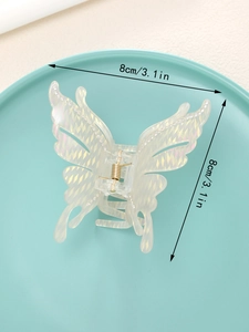 Détail d'une pince à cheveux papillon avec strass et marquage de taille 8cm 3.1in