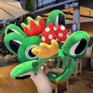 Cute green plush frog headband with funny cartoon eyes and crown for girls