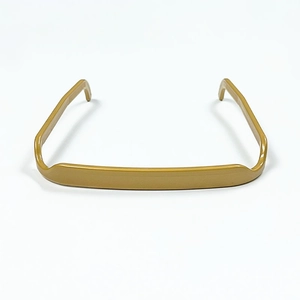 Detail view of mustard yellow square headband with a glossy finish and U-shaped design
