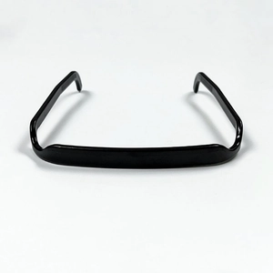 Close-up of black square headband with non-slip texture and glossy plastic finish