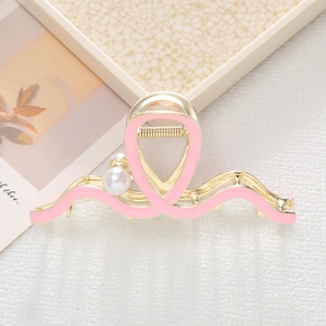 Pink enamel wavy hair claw clip with pearl detail and golden metal spring for women
