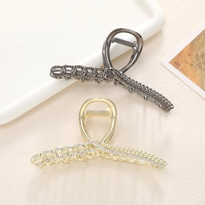 Elegante pinza para el cabello grande de aleación con diamantes para mujer en oro y negro