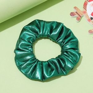 Sparkling mermaid green sequin scrunchie with metallic finish and Christmas decoration