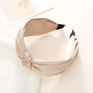 Elegant champagne satin wide knotted headband with a vintage French style for women