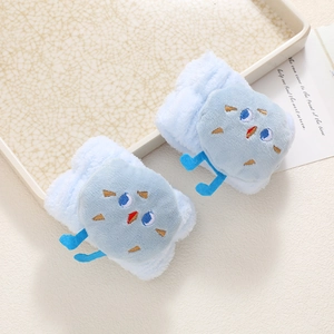 Close-up of light blue plush wrist washbands made of soft coral fleece with cute embroidery