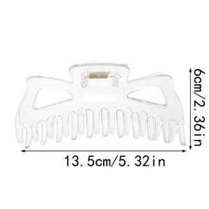 Detailed size view of a large clear hair claw clip showing 13.5cm width and 6cm height