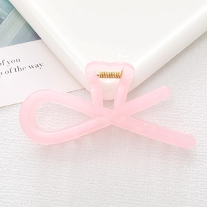 Pink translucent hollow criss-cross hair claw clip with gold spring for women