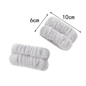 Absorbent plush wristbands in grey color with precise 10cm by 6cm size dimensions