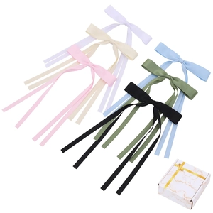 Detailed set of multi-color long ribbon bow hair clips with elegant gift packaging box