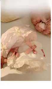 Set di cerchietti in pizzo rosa e bianco con balze in organza e fiocchi di raso