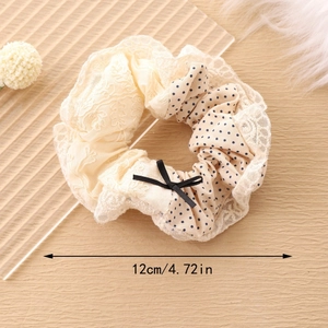 Scrunchie in pizzo francese a pois con fiocco nero in elegante tessuto bianco crema