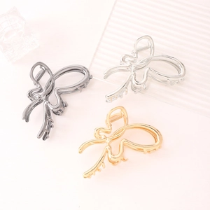 Elegant hollow butterfly hair claws in silver, gold and cream colors for women