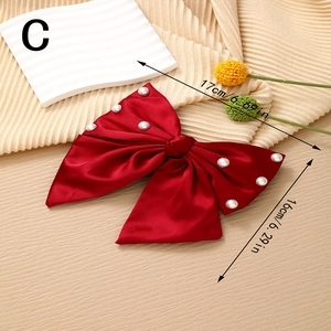 Elegant red satin bow hair clip with white pearls, size 17x16cm for women