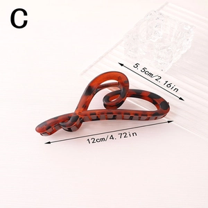 Matte irregular heart leopard print hair claw clip in tortoiseshell resin finish 12cm