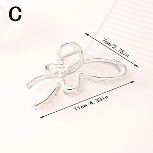 Detail view of silver hollow butterfly hair claw clip with dimensions 11cm by 7cm