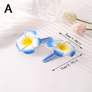 Detail of 5cm plumeria flower hair clips with blue gradient petals and dimensions