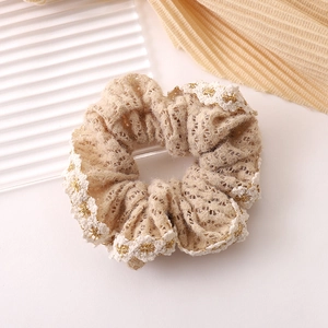 Elegant beige lace scrunchie with floral gold embroidery in a vintage French style