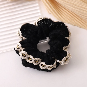 French vintage black scrunchie with lace edges and golden embroidery for high ponytail