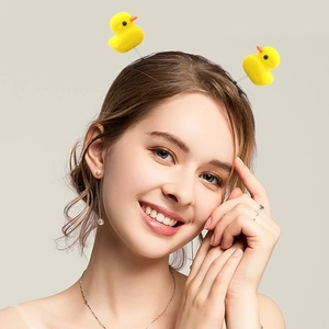 Niedliche Cartoon-Enten-Haarspangen mit Sprungfedereffekt für Damen im 2er-Set