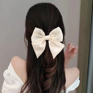 Elegant large cream satin and tulle bow hair clip with pearl accents for women