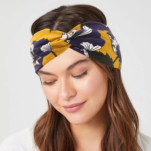 Vintage yellow floral twist headband with purple flowers for yoga and casual sports styling