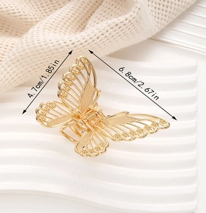 Detailed size view of golden butterfly hair claw clip with 6.8cm length measurements