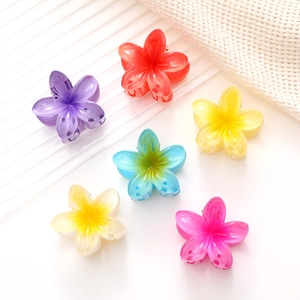 Set of six colorful acrylic plumeria flower hair claws in jelly translucent resin finish