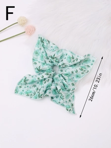 Floral print chiffon scrunchie with long ribbon streamers measuring 10.23 inches long