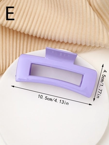 Detail view of purple matte hair claw clip showing dimensions of 10.5cm by 4.5cm