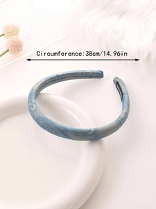Detail view of blue paisley floral satin headband with circumference measurement 38cm