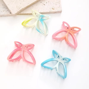 Gradient butterfly hair claw clips set with hollow design in four vibrant pastel colors