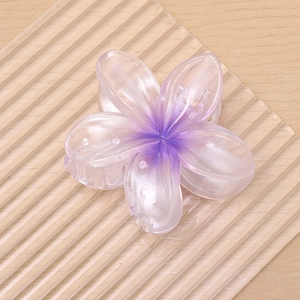 Pearlescent frangipani flower hair claw clip with purple gradient and matte finish