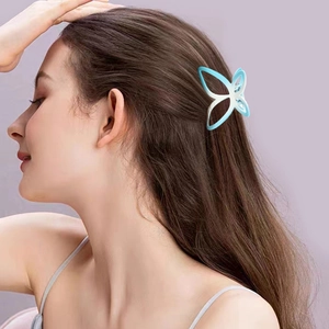 Elegant butterfly hair claw clip with blue and white gradient for women's hairstyle