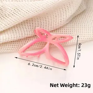 Detailed view of pink gradient butterfly hair claw clip with size dimensions 6.2cm x 4cm
