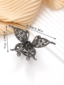 Detail der Schmetterlings-Haarklammer in Gunmetal mit grauen Strasssteinen und Maßen