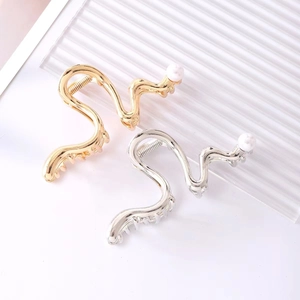 Elegant gold and silver wave metal hair claws with pearl accents for women