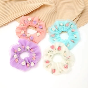 Set van vier bloemen organza scrunchies in pastel roze, paars, blauw en crème kleuren