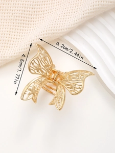 Detailansicht einer goldenen Schmetterlings-Haarklammer mit Maßen 6,2 cm und 4,5 cm