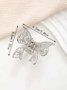 Silberne Schmetterlings-Haarklammer mit filigranem Metall-Design und Seestern-Relief