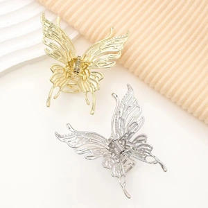 Elegante Schmetterlings-Haarklammern aus Gold und Silber mit minimalistischem Hohlraum