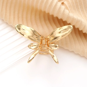 Eleganter goldener Schmetterlings-Haarclip aus Metall mit glänzendem Finish für Damen