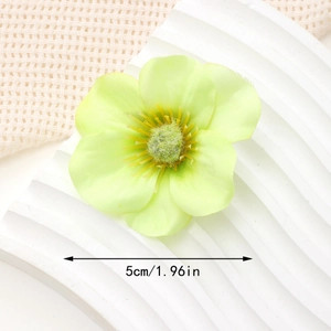 Detail showing a 5cm light green fabric silk flower with stamens for DIY hair accessories