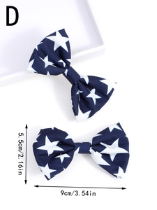 Fermagli a fiocco blu navy con stelle bianche e dimensioni di 9 cm x 5,5 cm